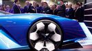 Renault's Chief Executive Luca De Meo gestures as he speaks with French President Emmanuel Macron at the 2022 Paris Auto Show, in Paris, France, October 17, 2022. REUTERS