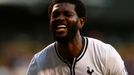 Tottenham Hotspur's Adebayor reacts after missing a chance to score against Arsenal during their English Premier League soccer match in London