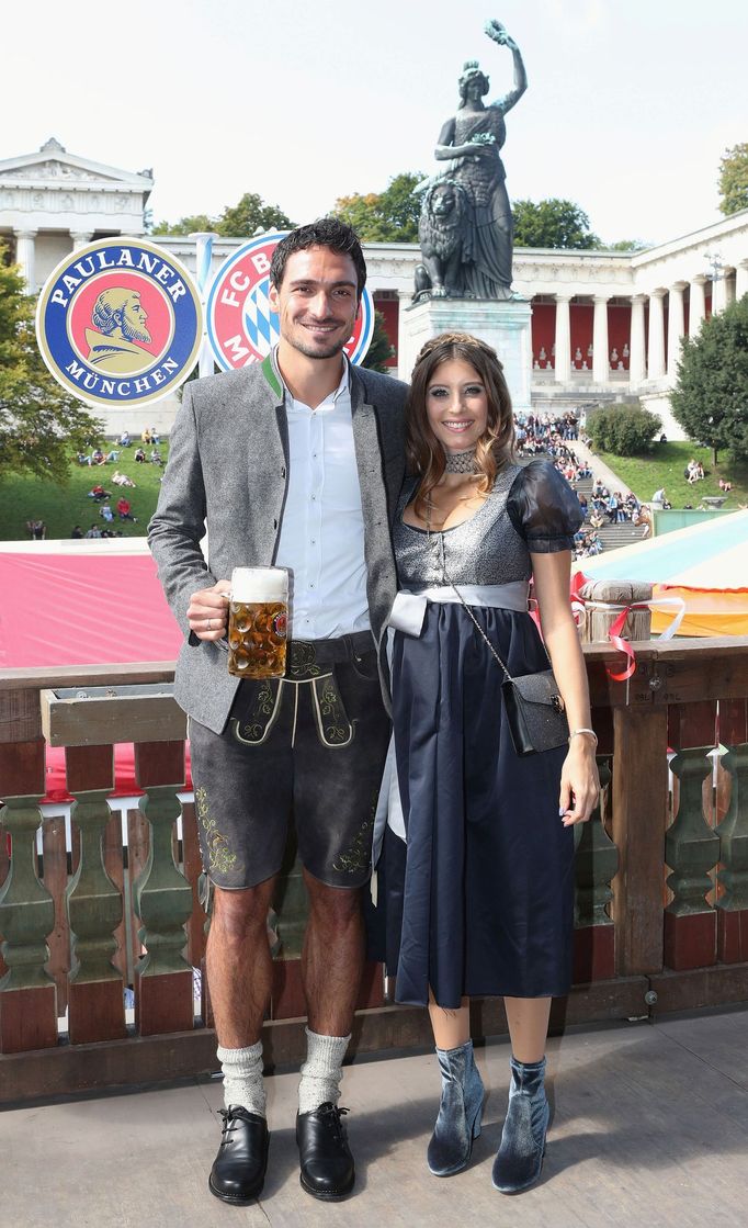 FC Bayern Munich's Hummels and his wife Cathy pose during their visit at the Oktoberfest in Munich