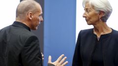 Greek Finance Minister Varoufakis talks to IMF Managing Director Lagarde during an euro zone finance ministers meeting in Luxembourg