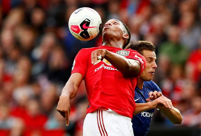 Soccer Football - Premier League - Manchester United v Chelsea - Old Trafford, Manchester, Britain - August 11, 2019  Manchester United's Anthony Martial in action with C