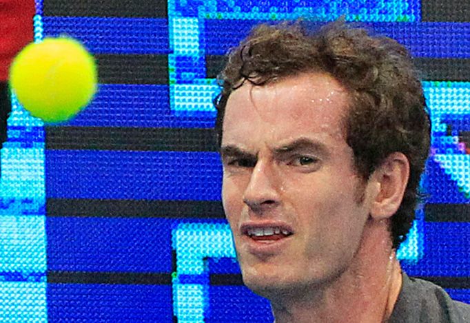 Andy Murray of the Manila Mavericks eyes the ball during his men's singles tennis match against Marin Cilic of the UAE Royals at the International Premier Tennis League (