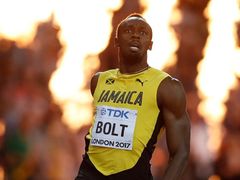 Usain Bolt a jeho reakce po závodě.