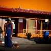 Woman poses for a friend's photo in the Little Ethiopia area of Los Angeles