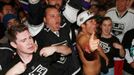 Los Angeles Kings hockey fans celebrate outside Staples Center after the Kings beat the New York Rangers 3-2 in the second overtime to win the Stanley Cup Finals in Los A