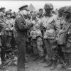 Handout photo of Allied forces Supreme Commander General Eisenhower speaking with U.S. Army paratroopers at Greenham Common Airfield in England