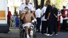 An Israeli survivor is carried on a wheelchair to an ambulance as he leaves a hospital in the city of Burgas, some 400km (249 miles) east of Sofia July 19, 2012, en route to Israel. A suicide bomber committed the attack that killed eight people in a bus transporting Israeli tourists at a Bulgarian airport, the country's interior minister said on Thursday, and Israel accused Iranian-backed Hezbollah militants of responsibility. REUTERS/Stoyan Nenov (BULGARIA - Tags: CRIME LAW TRANSPORT)