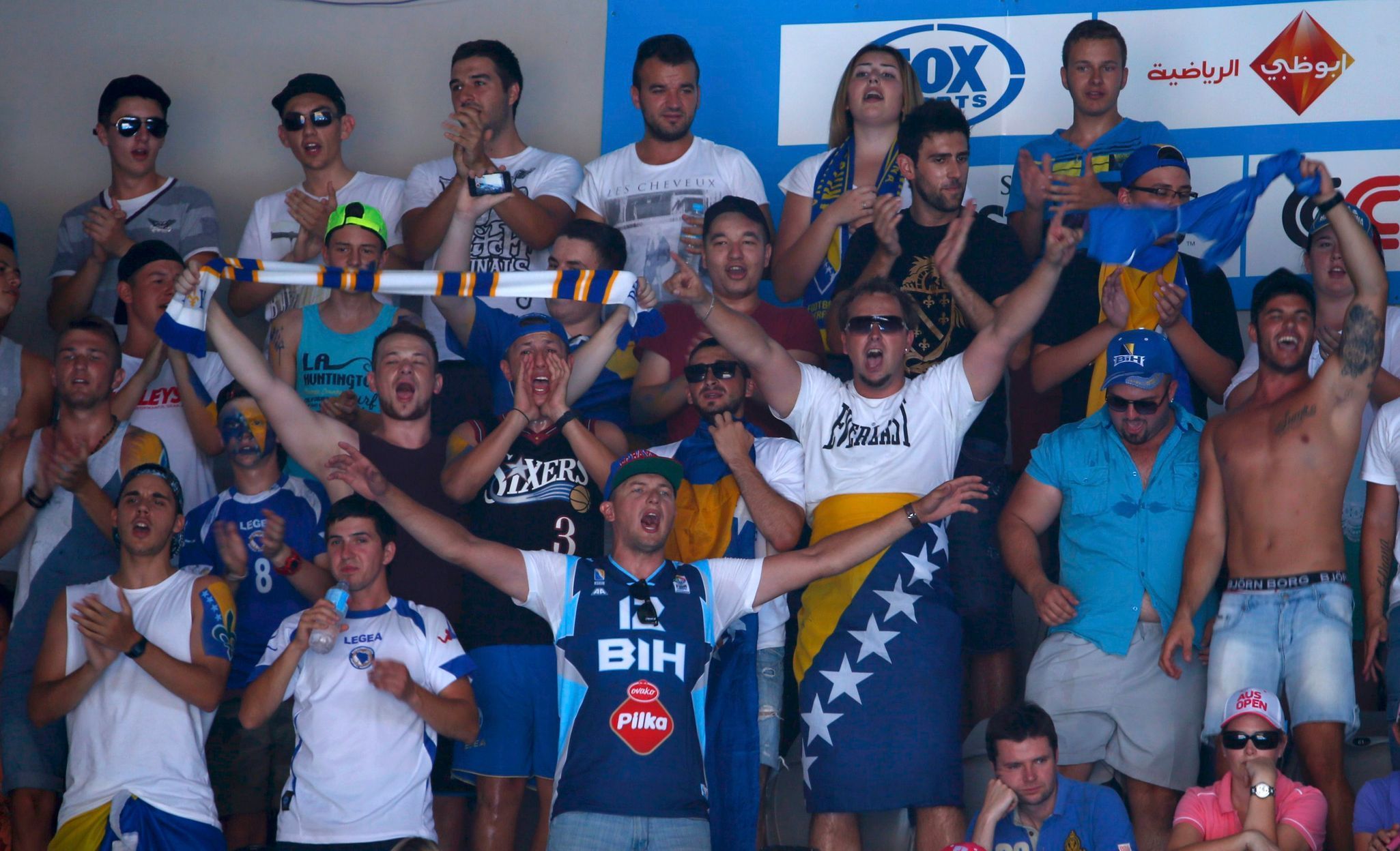 Fans of Damir Dzumhur of Bosnia and Herzegovina cheers during his men's singles match against Tomas Berdych of Czech Republic at the Australian Open 2014 tennis tournament in Melbourne