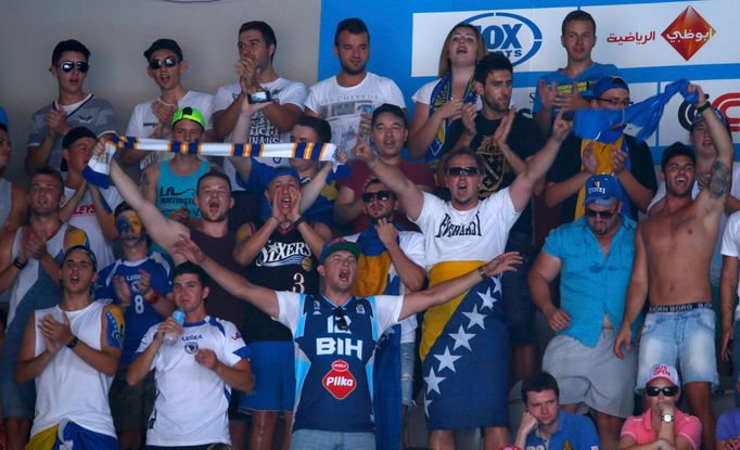 Fans of Damir Dzumhur of Bosnia and Herzegovina cheers during his men's singles match against Tomas Berdych of Czech Republic at the Australian Open 2014 tennis tournamen