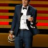 Ty Burrell accepts the award for Outstanding Supporting Actor In A Comedy Series for his role in &quot;Modern Family&quot; during the 66th Primetime Emmy Awards in Los Angeles