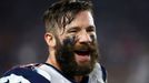 New England Patriots wide receiver Julian Edelman smiles on the sidelines during the NFL Super Bowl XLIX football game against the Seattle Seahawks in Glendale, Arizona,