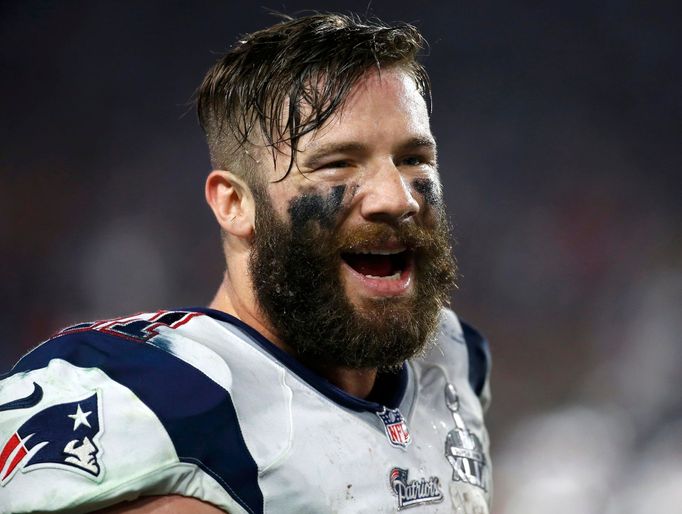 New England Patriots wide receiver Julian Edelman smiles on the sidelines during the NFL Super Bowl XLIX football game against the Seattle Seahawks in Glendale, Arizona,