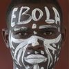 An actor is pictured before a performance during an awareness campaign against Ebola at Anono school in Abidjan