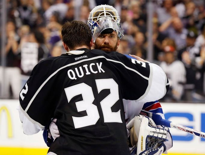 New York Rangers' goalie Henrik Lundqvist (R) congratulates Los Angeles Kings' goalie Jonathan Quick after the Kings defeated the Rangers to win the Stanley Cup in Game 5