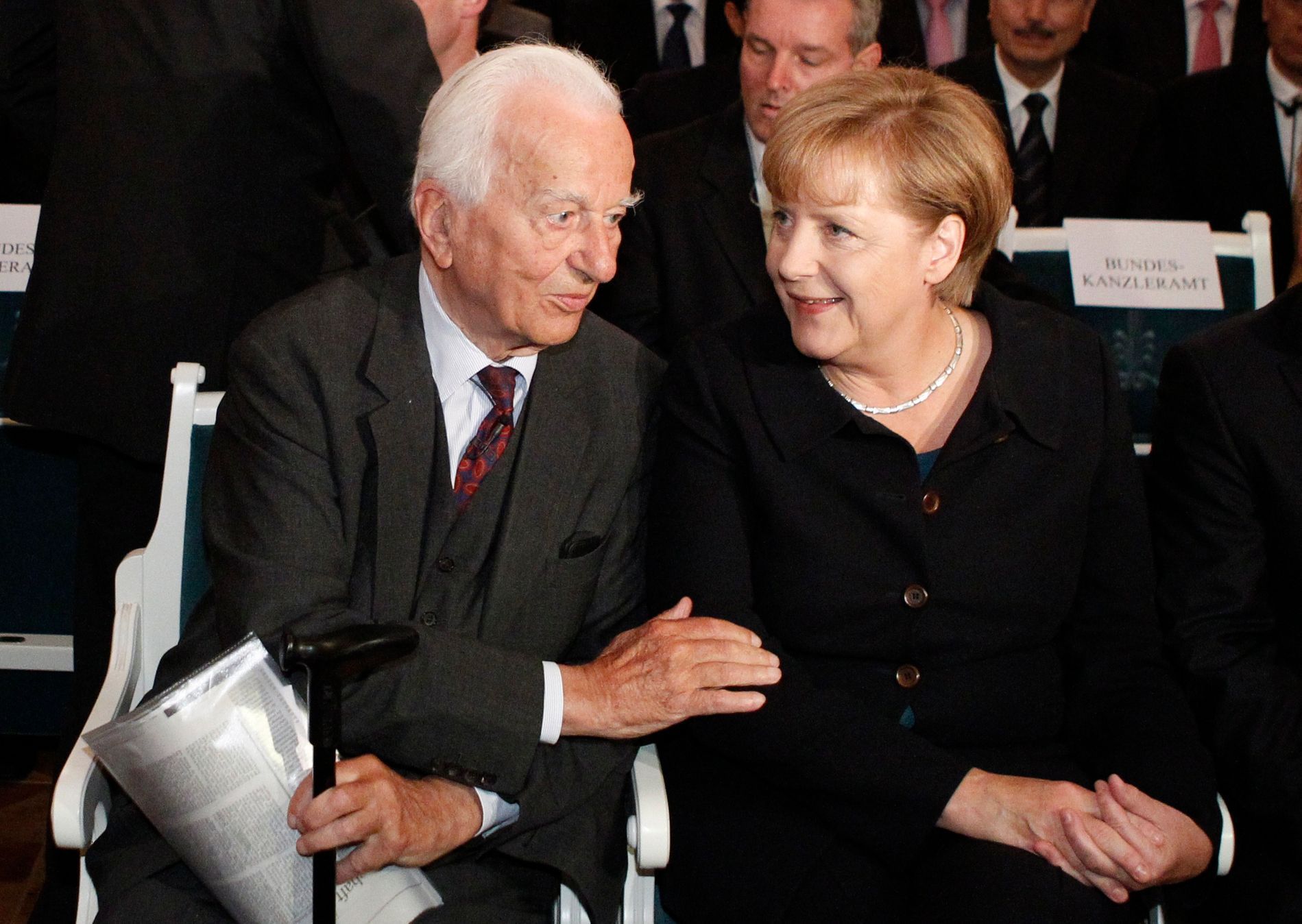 File photo of German Chancellor Merkel talking with former President von Weizsaecker during ceremony in Berlin