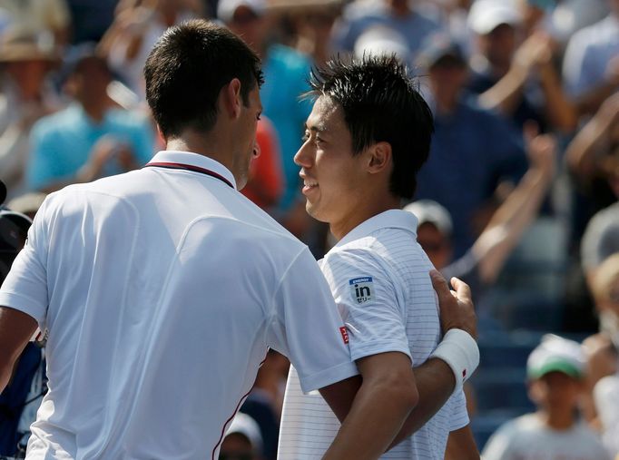 Novak Djokovič a Kei Nišikori v semifinále US Open