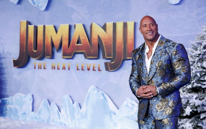 FILE PHOTO: Cast member Dwayne Johnson poses at the premiere for the film "Jumanji: The Next Level" in Los Angeles, California, U.S., December 9, 2019. REUTERS/Mario Anzu