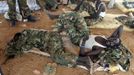 South Sudan's SPLA soldiers rest near an oil field in Unity State