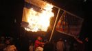 Supporters of Sunni Muslim Salafist leader Ahmad al-Assir burn an Israeli and a U.S. flag during a protest against a film they consider blasphemous to Islam and insulting to the Prophet Mohammad, in Sidon, southern Lebanon September 13, 2012.