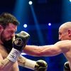 German WBO super-middleweight boxer, Arthur Abraham (R), exchanges punches with his challenger, Britain's Paul Smith, during their title fight in Berlin