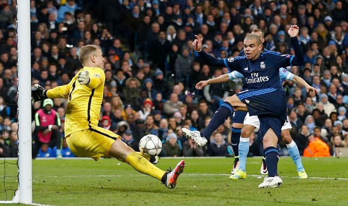 Manchester City's Joe Hart saves from Real Madrid's Pepe