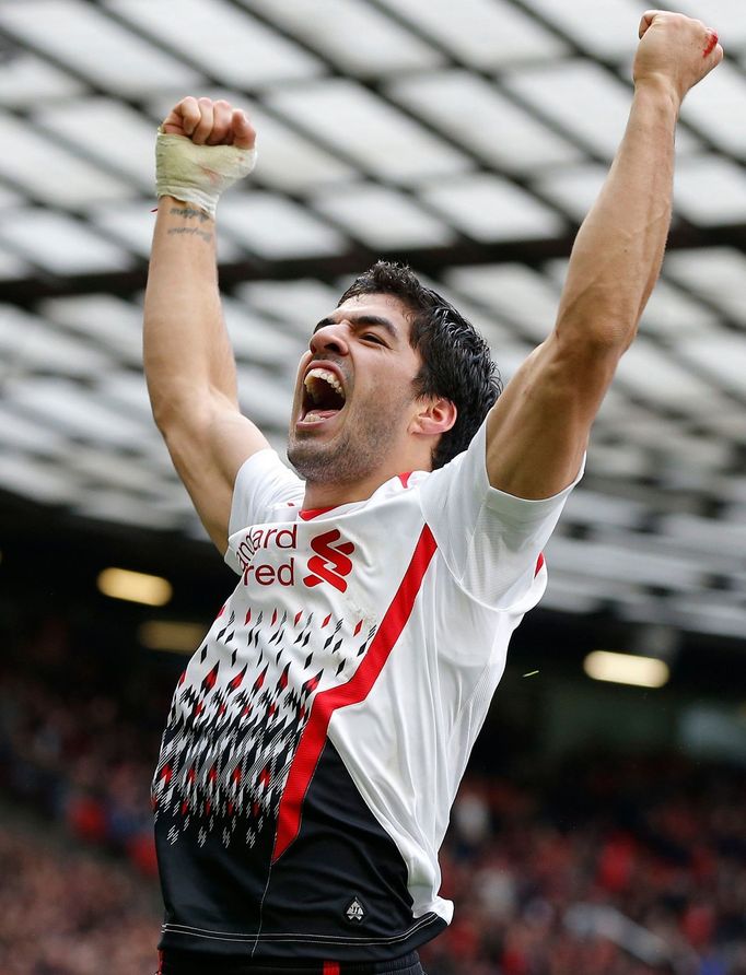 Liverpool's Suarez celebrates his goal against Manchester United during their English Premier League soccer match in Manchester