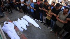 Funeral of Palestinians killed in overnight Israeli strikes, according to medics, at Al-Shifa Hospital in Gaza City