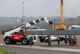 Ne všichni piloti se s mokrým asfaltem vypořádali se ctí. Romain Grosjean zaparkoval svůj Haas do štěrkové únikové zóny už v první části kvalifikace.