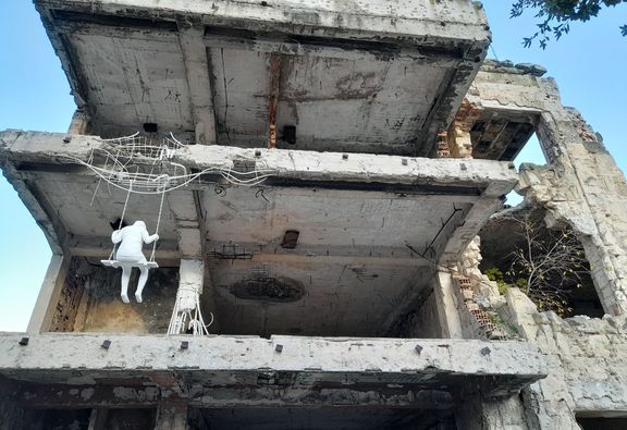 Zničené domy v Mostaru