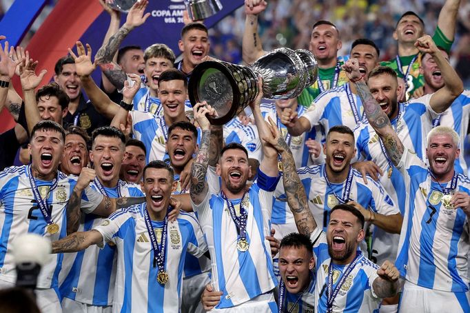 Soccer Football - Copa America 2024 - Final - Argentina v Colombia - Hard Rock Stadium, Miami, Florida, United States - July 15, 2024 Argentina's Lionel Messi lifts the t