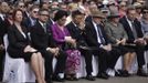 REFILE - CORRECTING IDENTITY OF WOMAN ON THIRD LEFT (L-R) Australian Prime Minister Julia Gillard, Indonesian Foreign Minister Marty Natalegawa, Indonesian Health Minister Nafsiah Mboi, Bali Governor Made Mangku Pastika, former Australian Prime Minister John Howard and his wife Janette Howard, leader of the Opposition in the Australian House of Representatives Anthony John Abbott pray as they observe a moment of silence in memory of the victims of the 2002 Bali bomb blast during the commemoration service for the 10th anniversary of the Bali bombing in Garuda Wisnu Kencana (GWK) cultural park in Jimbaran, Bali October 12, 2012. Eighty-eight Australians were among the 202 people killed in the attacks on the Sari Club and Paddy's Bar at the popular tourist area of Kuta on October 12, 2002. REUTERS/Beawiharta (INDONESIA - Tags: ANNIVERSARY POLITICS) Published: Říj. 12, 2012, 4:56 dop.