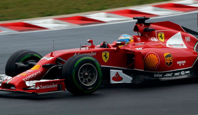 Ferrari Formula One driver Fernando Alonso of Spain drives during the Hungarian F1 Grand Prix at the Hungaroring circuit, near Budapest July 27, 2014. REUTERS/Laszlo Balo