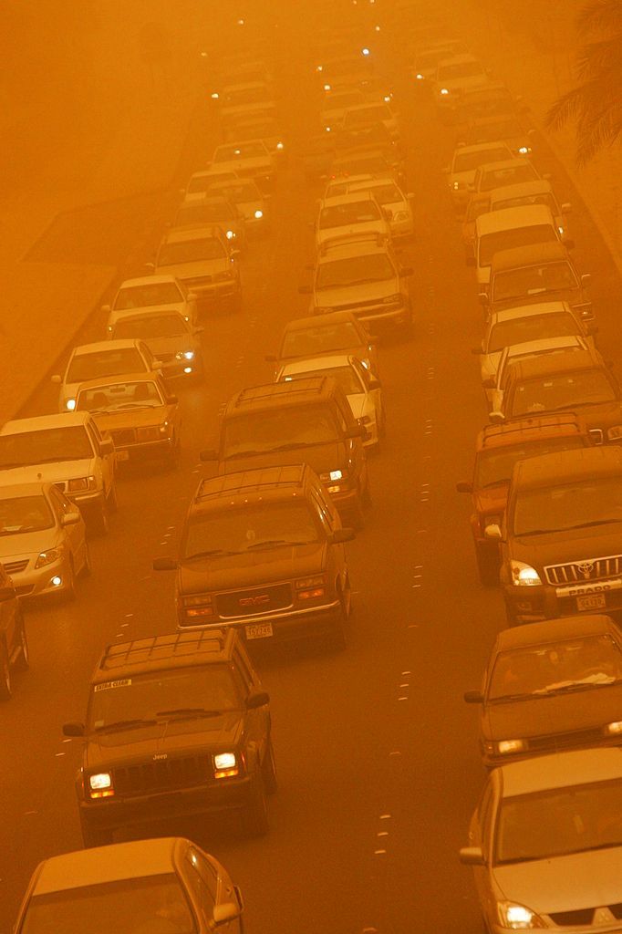 Traffic moves slowly along a highway during a sandstorm in Kuwait City on April 30, 2008. Sand filled the air as winds reached some 85 kilometres per hour.