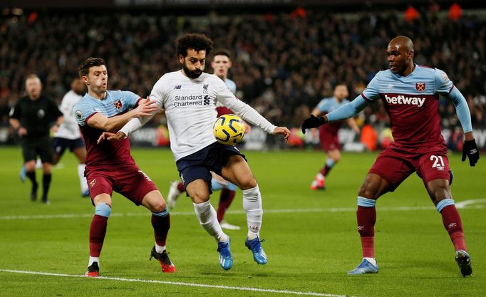 Soccer Football - Premier League - West Ham United v Liverpool - London Stadium, London, Britain - January 29, 2020   West Ham United's Aaron Cresswell and Angelo Ogbonna