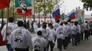 Members of a youth club supporting former Chechen leader Akhmad Kadyrov march along the street during a rally in the centre of the Chechen capital Grozny April 25, 2013. The naming of two Chechens, Dzhokhar and Tamerlan Tsarnaev, as suspects in the Boston Marathon bombings has put Chechnya - the former site of a bloody separatist insurgency - back on the world's front pages. Chechnya appears almost miraculously reborn. The streets have been rebuilt. Walls riddled with bullet holes are long gone. New high rise buildings soar into the sky. Spotless playgrounds are packed with children. A giant marble mosque glimmers in the night. Yet, scratch the surface and the miracle is less impressive than it seems. Behind closed doors, people speak of a warped and oppressive place, run by a Kremlin-imposed leader through fear. Picture taken April 25, 2013. REUTERS/Maxim Shemetov (RUSSIA - Tags: SOCIETY POLITICS RELIGION) ATTENTION EDITORS: PICTURE 13 OF 40 FOR PACKAGE 'INSIDE MODERN CHECHNYA'. SEARCH 'REBUILDING CHECHNYA' FOR ALL IMAGES Published: Kvě. 1, 2013, 7:45 dop.