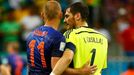 Arjen Robben of the Netherlands and Spain's Iker Casillas acknowledge each other after their 2014 World Cup Group B soccer match at the Fonte Nova arena in Salvador June