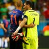 Robben of the Netherlands and Spain's Casillas acknowledge each other after their 2014 World Cup Group B soccer match at the Fonte Nova arena in Salvador