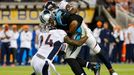 Carolina Panthers' quarterback Cam Newton is sacked by Denver Broncos' DeMarcus Ware (94)