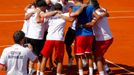 Čeští tenisté slaví postup do finále Davis Cupu 2012 po utkání Tomáše Berdycha s Atgentincem Carlosem Berlocqem.