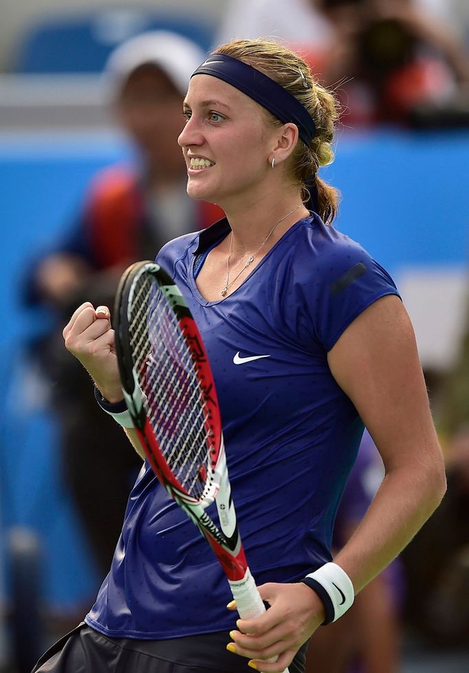 Petra Kvitova of the Czech Republic celebrates as she beats Elina Svitolina of Ukraine during their women's singles semi-final match at the Wuhan Open tennis tournament i