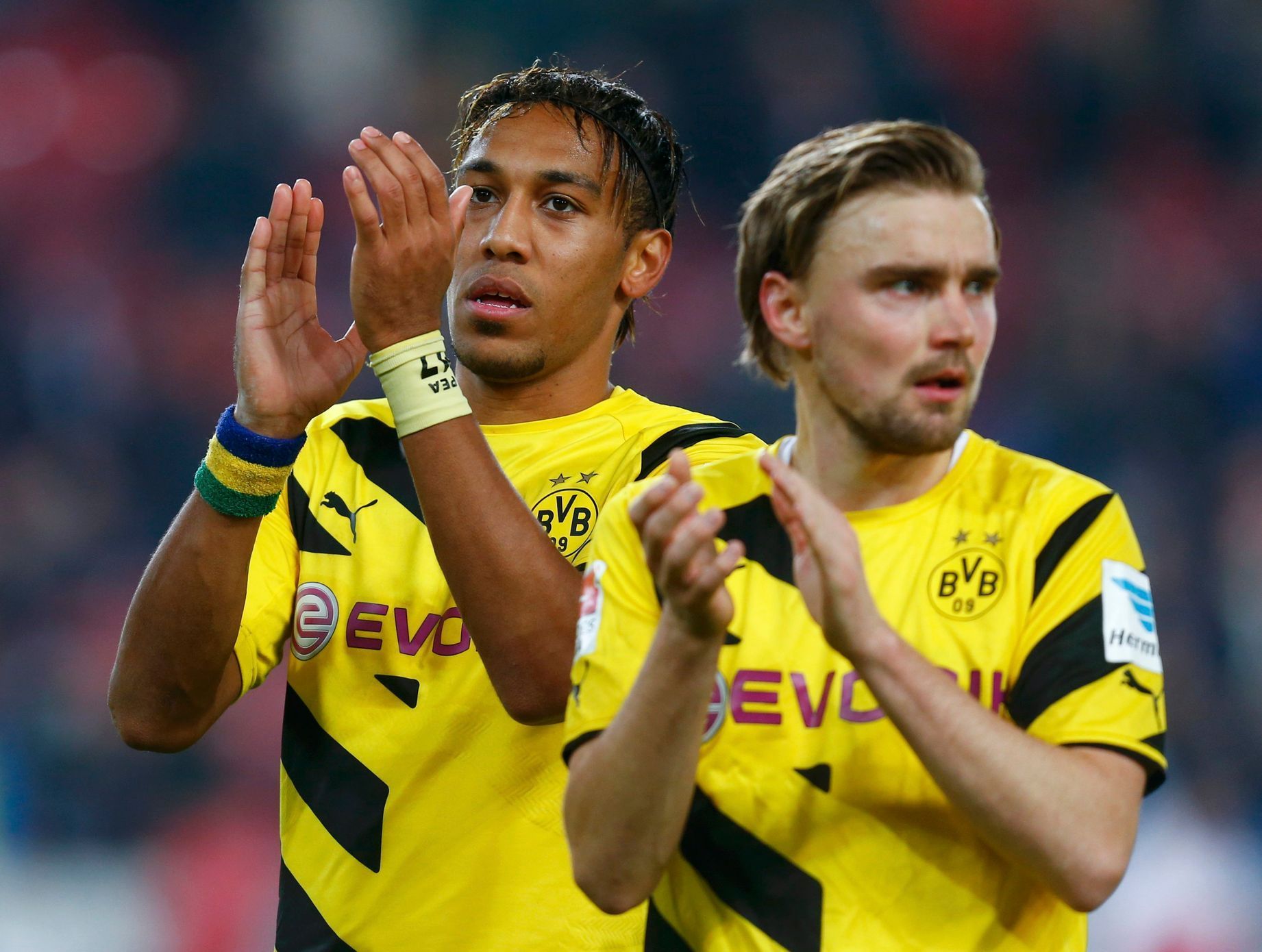 Borussia Dortmund's Aubameyang and Schmelzer acknowledge their supporters after their German first division Bundesliga soccer match against VfB Stuttgart in Stuttgart