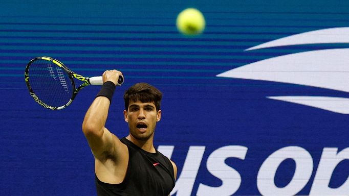 Aug 29, 2024; Flushing, NY, USA; Carlos Alcaraz (ESP) hits a forehand against Botic van De Zandschlup (NED)(not pictured) in a men's singles match on day four of the 2024