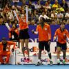 Team Micromax Indian Aces' Ivanovic of Serbia, Gael Monfils of France and Santoro of France react courtside during their mixed doubles match at the International Premier Tennis League (IPTL) in Singap