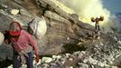 Mining Sulfur by Hand in Kawah Ijen Volcano Men working inside Kawah Ijen volcano, in East Java, Indonesia, one of the last places in the world where people mine sulfur b