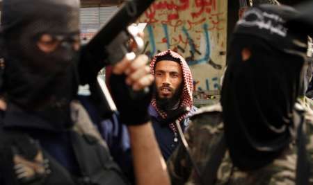 Účastník pohřbu v Gaze