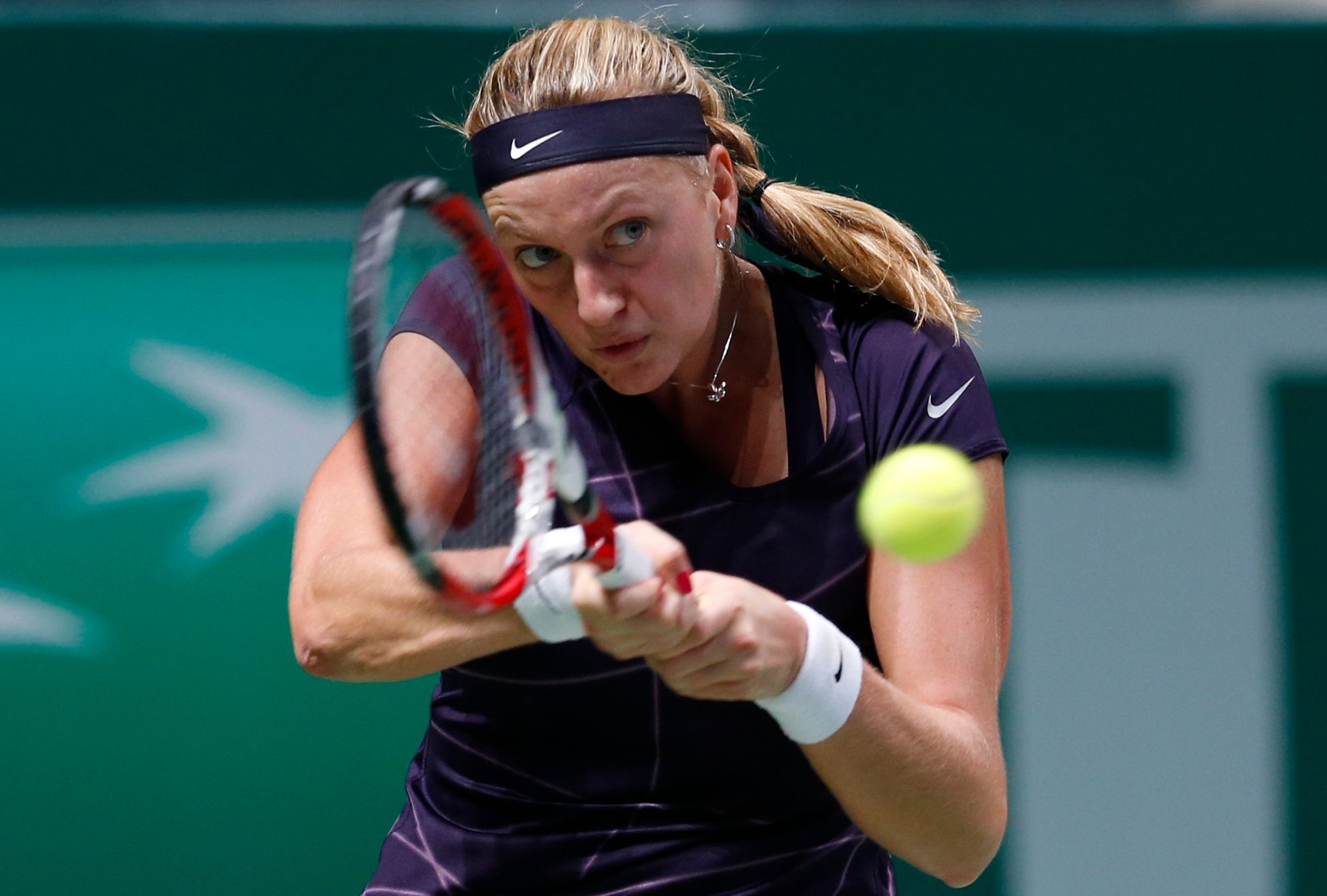 Kvitova of Czech Republic hits a return to Williams of the U.S. during their WTA tennis championships match at Sinan Erdem Dome in Istanbul