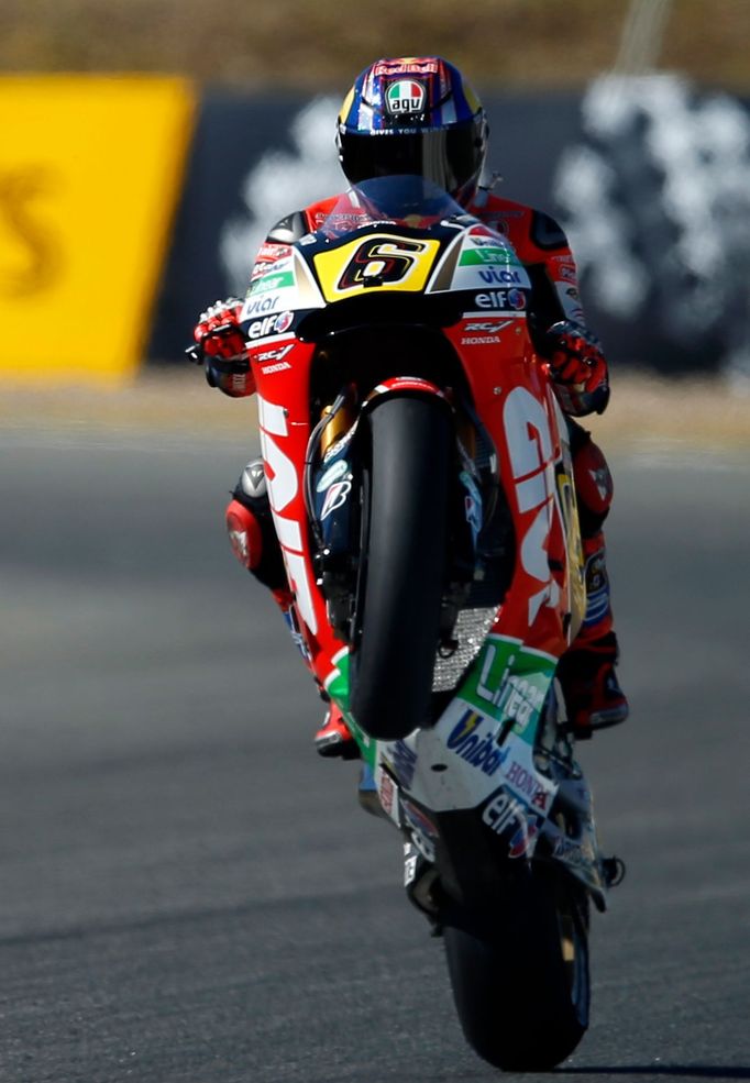 Honda MotoGP rider Stefan Bradl of Germany performs a wheelie during the third free practice session of the Spanish Grand Prix in Jerez de la Frontera, southern Spain, Ma