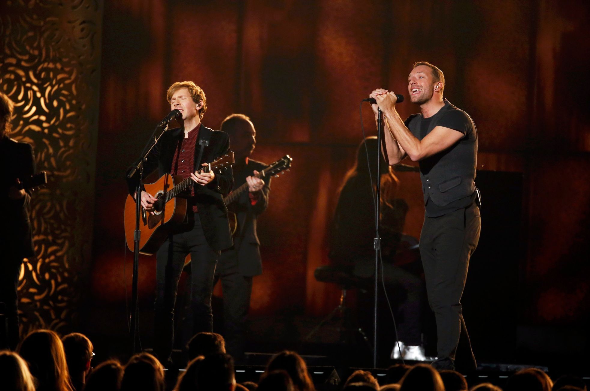 Beck and Chris Martin perform during the 57th annual Grammy Awards in Los Angeles