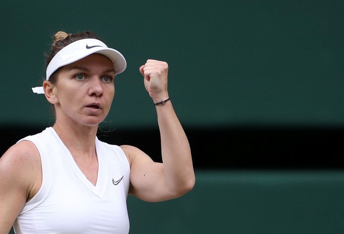 Tennis - Wimbledon - All England Lawn Tennis and Croquet Club, London, Britain - July 13, 2019  Romania's Simona Halep reacts during the final against Serena Williams of