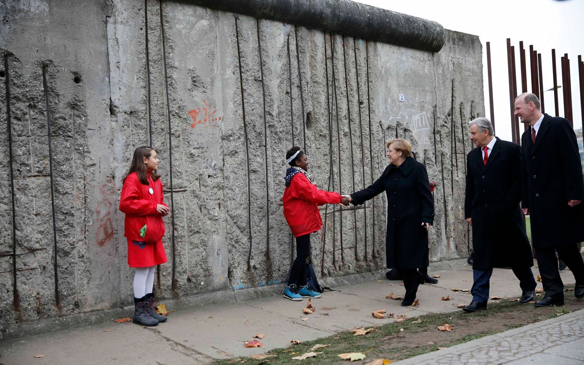 Merkelová u Berlínské zdi